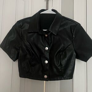 I am selling this leather jacket I never wore it before